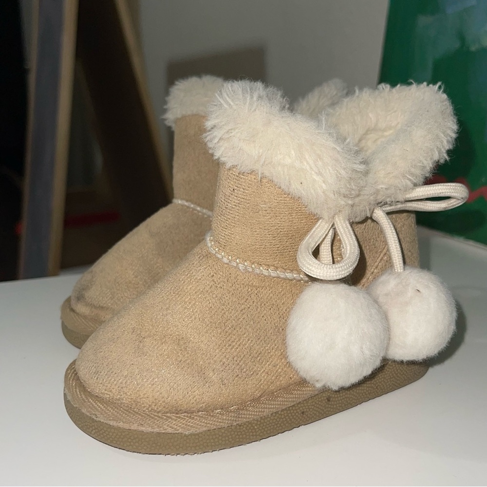 Cozy Tan Baby Booties with Pom Poms